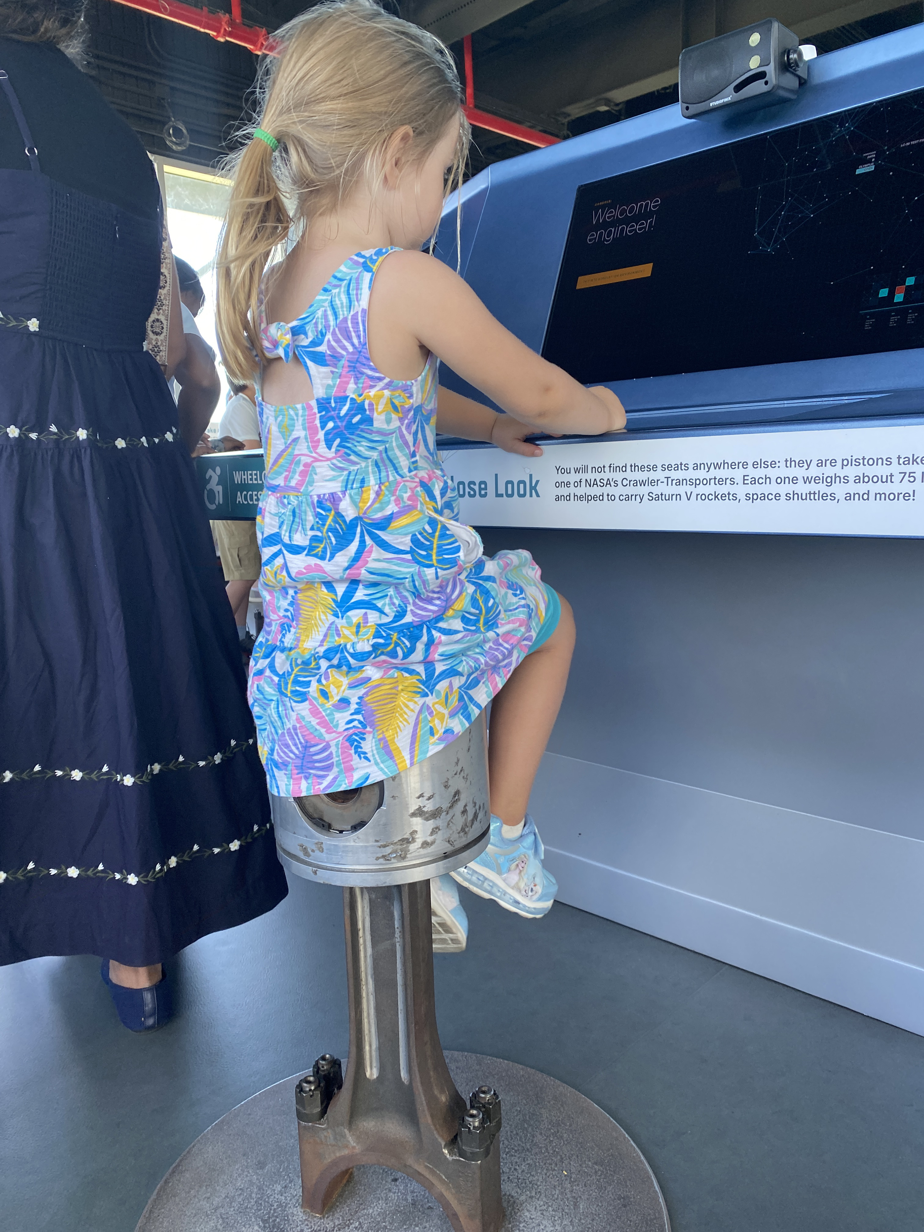 Sit atop a piston from a Crawler transporter while designing and launching your own rocket on a touch-screen computer. After the launch, you’ll receive a performance report along with suggestions as to how to adjust payload, fuel, and more to increase mission success. Photo by Alyssa J. Cobb.