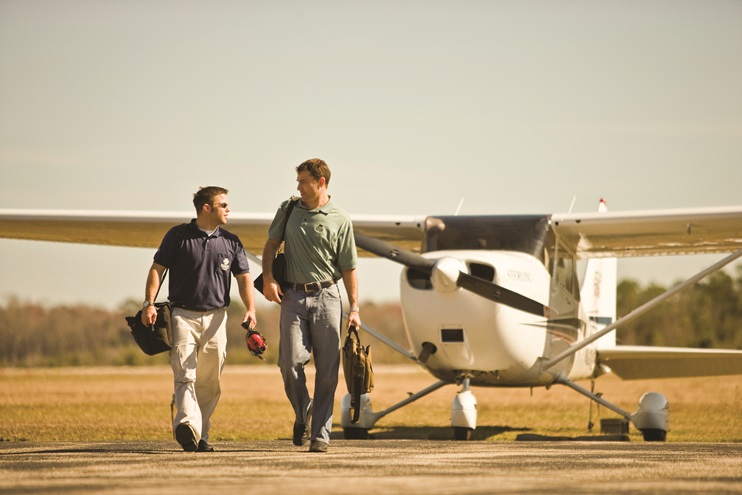 A student and instructor talking while walking to their Cessna 172 at Sterling Flight Center.
Jacksonville, FL   United States
Image#: 06-486_0277.jpg     Camera: Canon EOS-1Ds Mark II 
http://mikefizer.com    mike@mikefizer.com