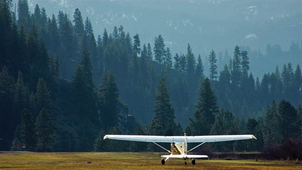 A Cessna 185 backtaxis during the annual Cessna 180/185 fly-in. Photo courtesy of Crista V. Worthy.