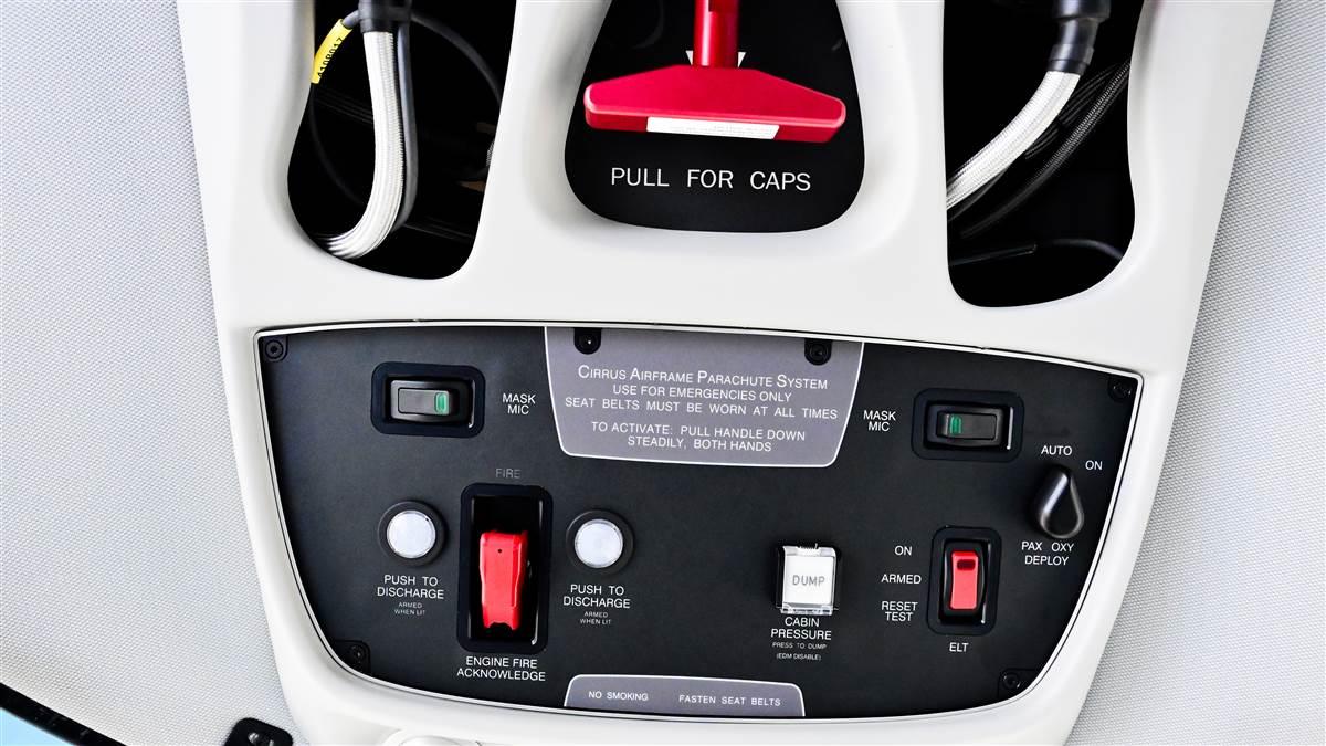 The red lever overhead between pilot and passenger is the release for the CAPS which is the ballistic parachute recovery system. Photography by David Tulis