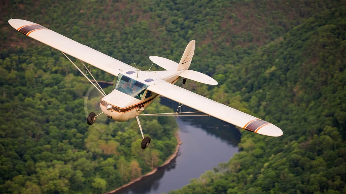 Following a path such as a river or road will help you orient yourself to the area and also help identify emergency landing sites. Photo by Chris Rose