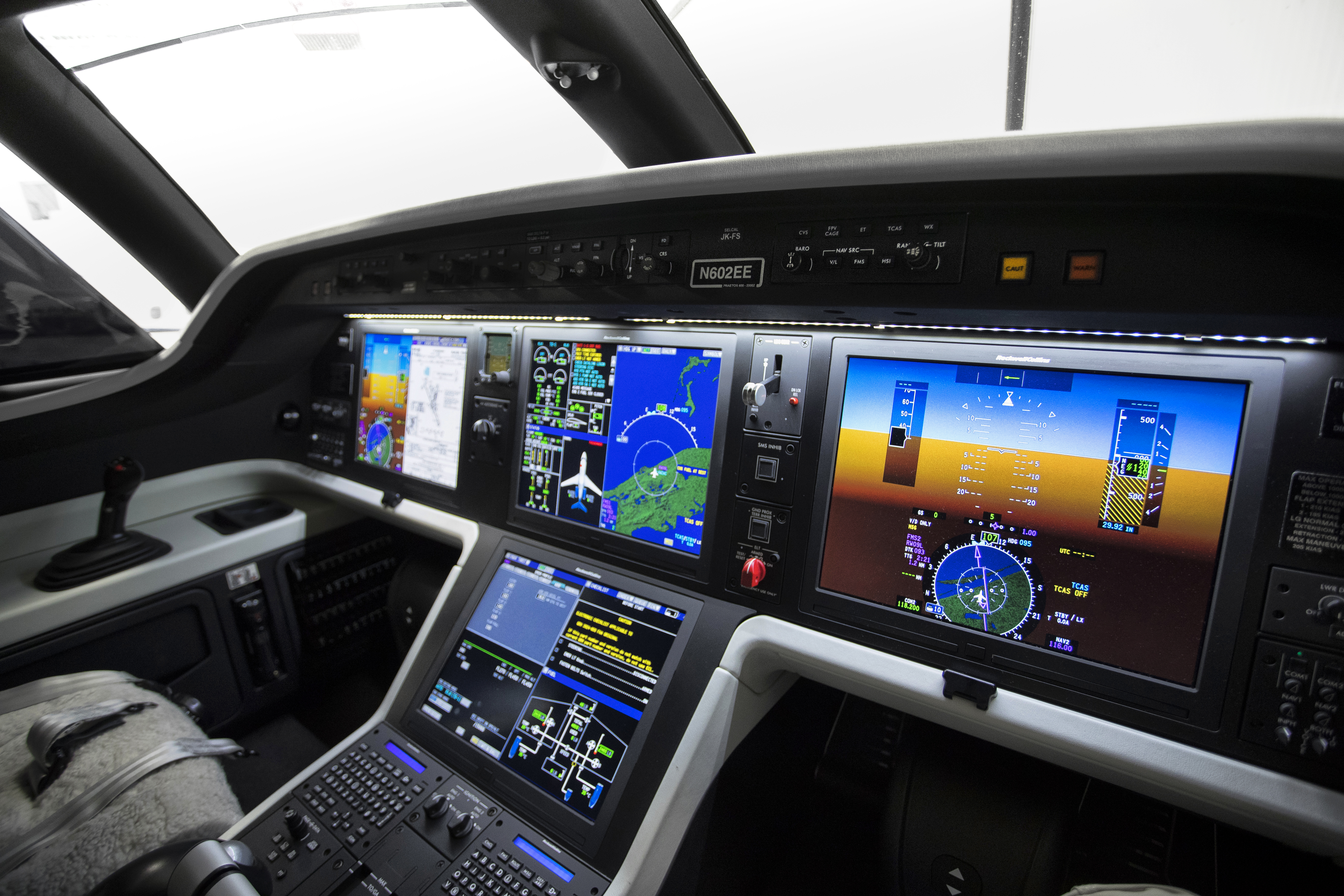 The cockpit is dominated by the Rockwell Collins Pro Line Fusion avionics suite and its four huge screens.