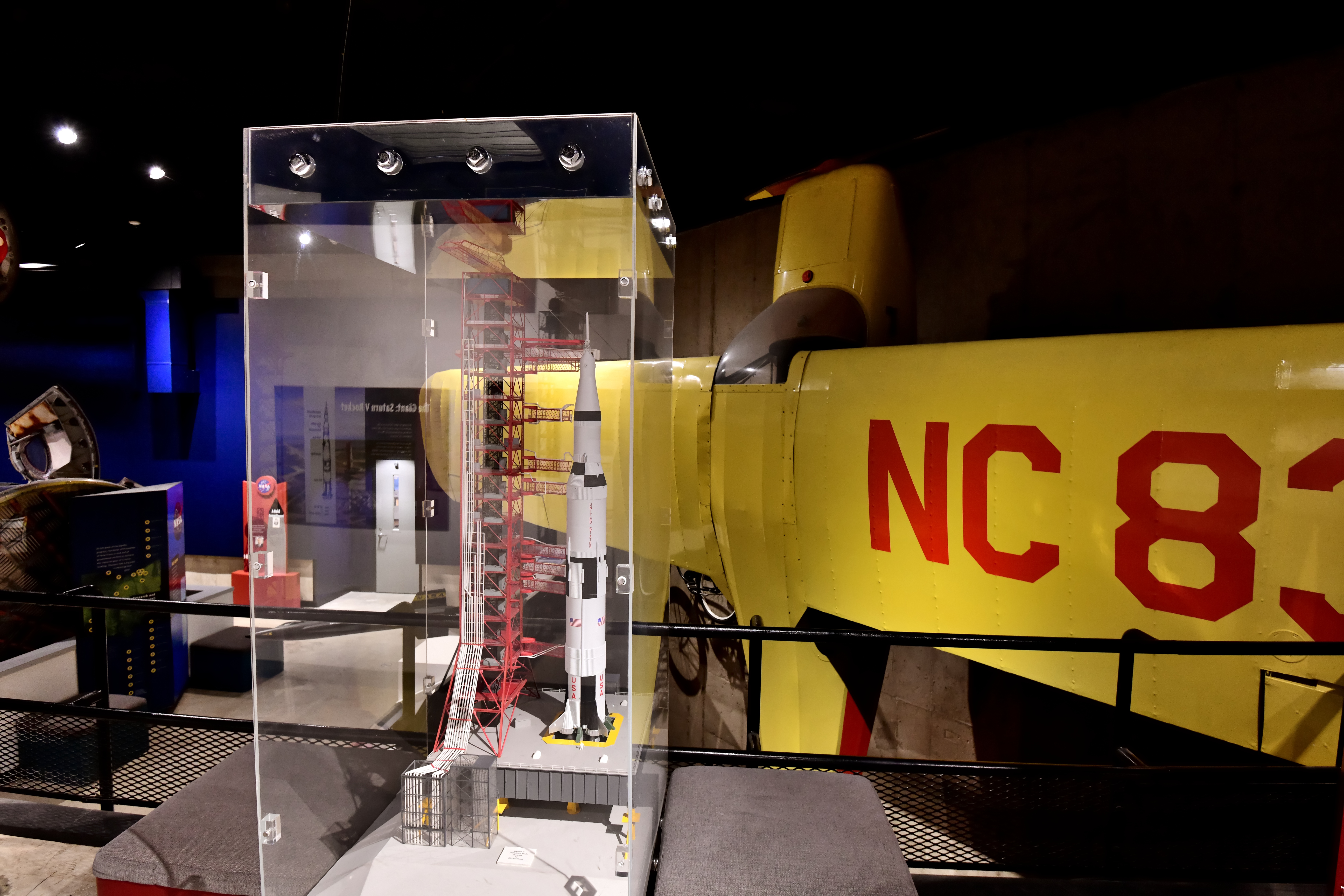 ...include the Aeronca Champ in which Neil Armstrong learned to fly—as well as a scale model of the Saturn V rocket he commanded on the Apollo 11 mission.
