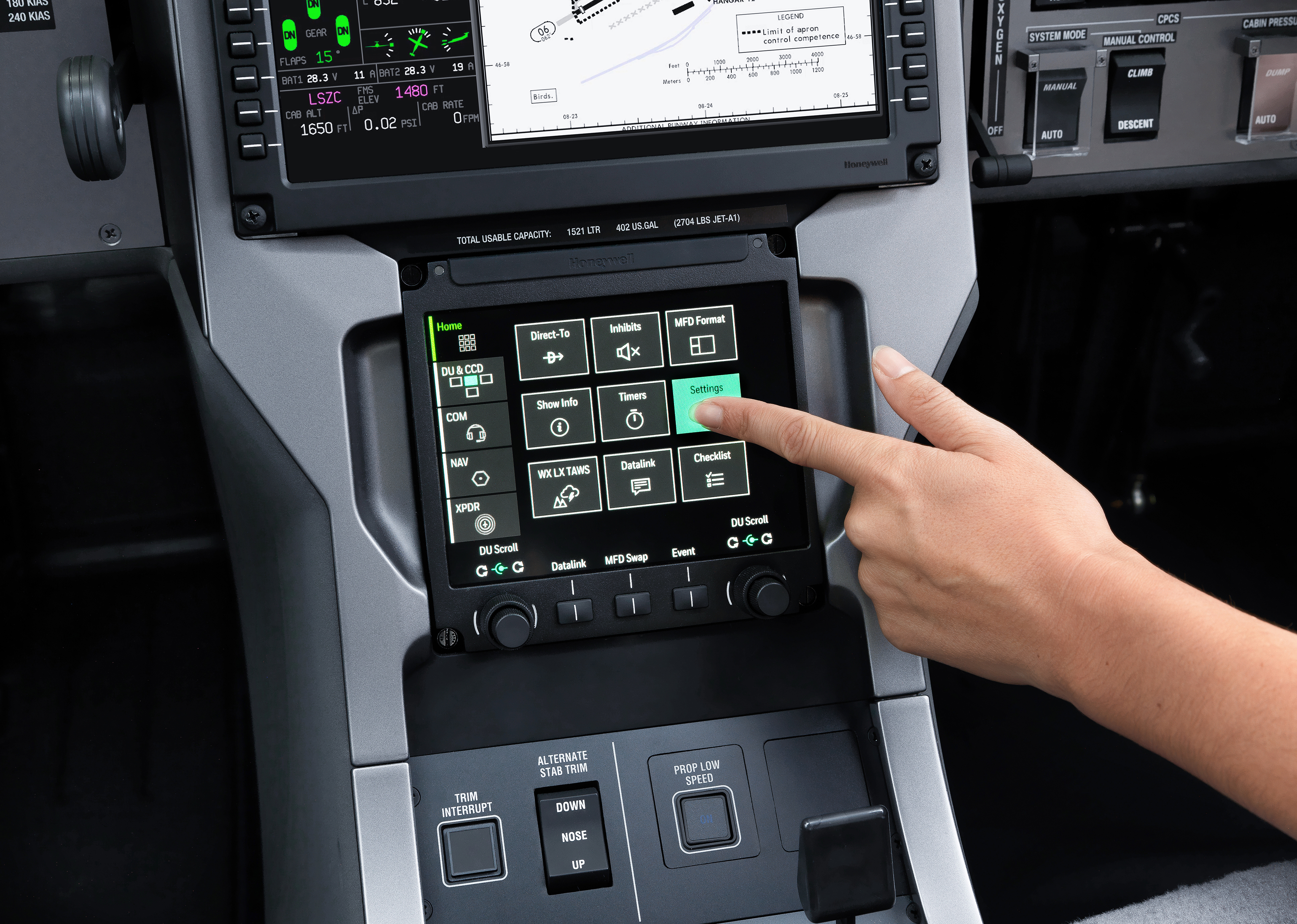 A single start switch is in the lower left corner of the overhead panel; new touchscreens let you arrange display views and screen views the way you like.