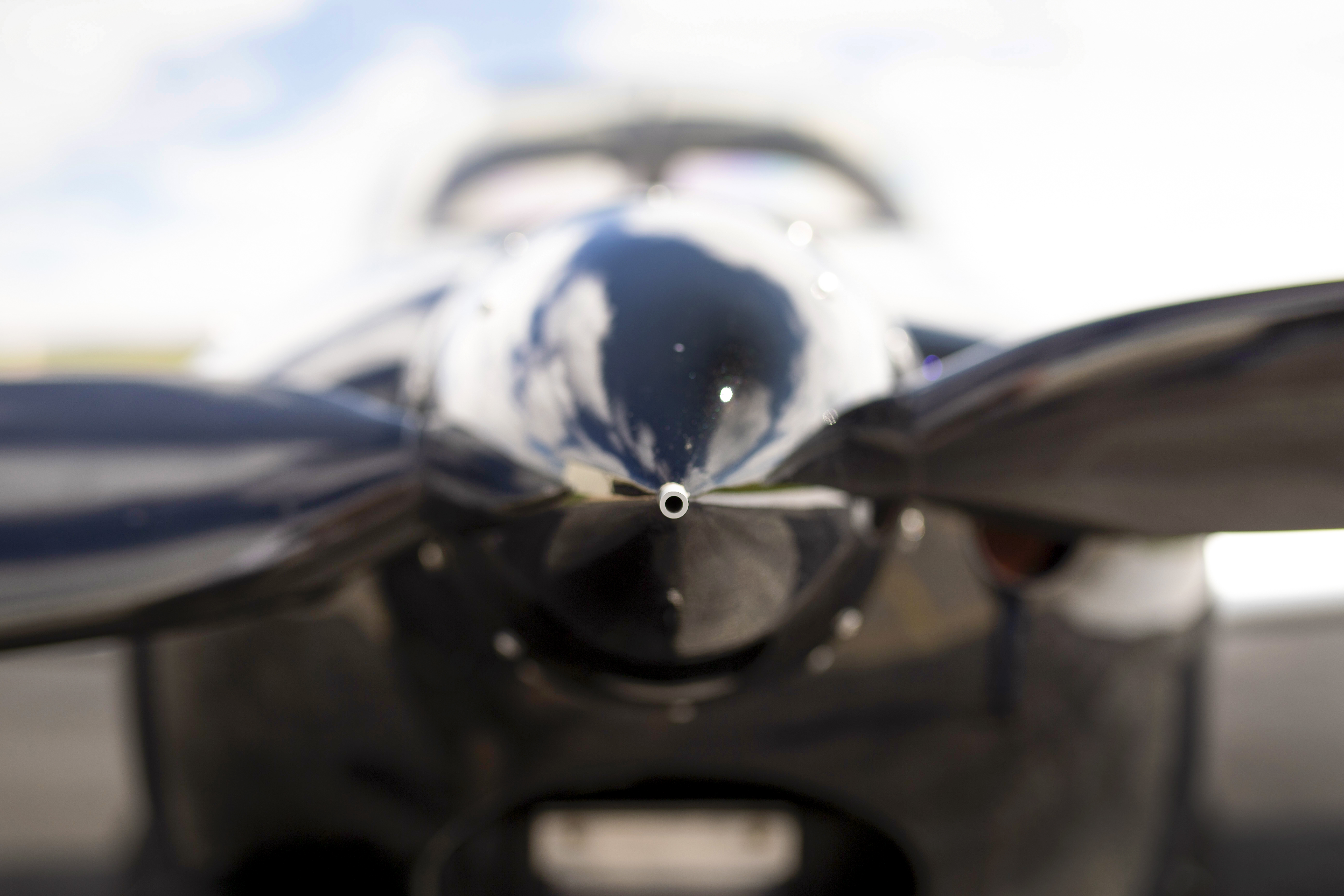 The pitot tube is oddly placed at the center of the spinner so that the wings can be removed and replaced without affecting the critical system that supplies airspeed information.