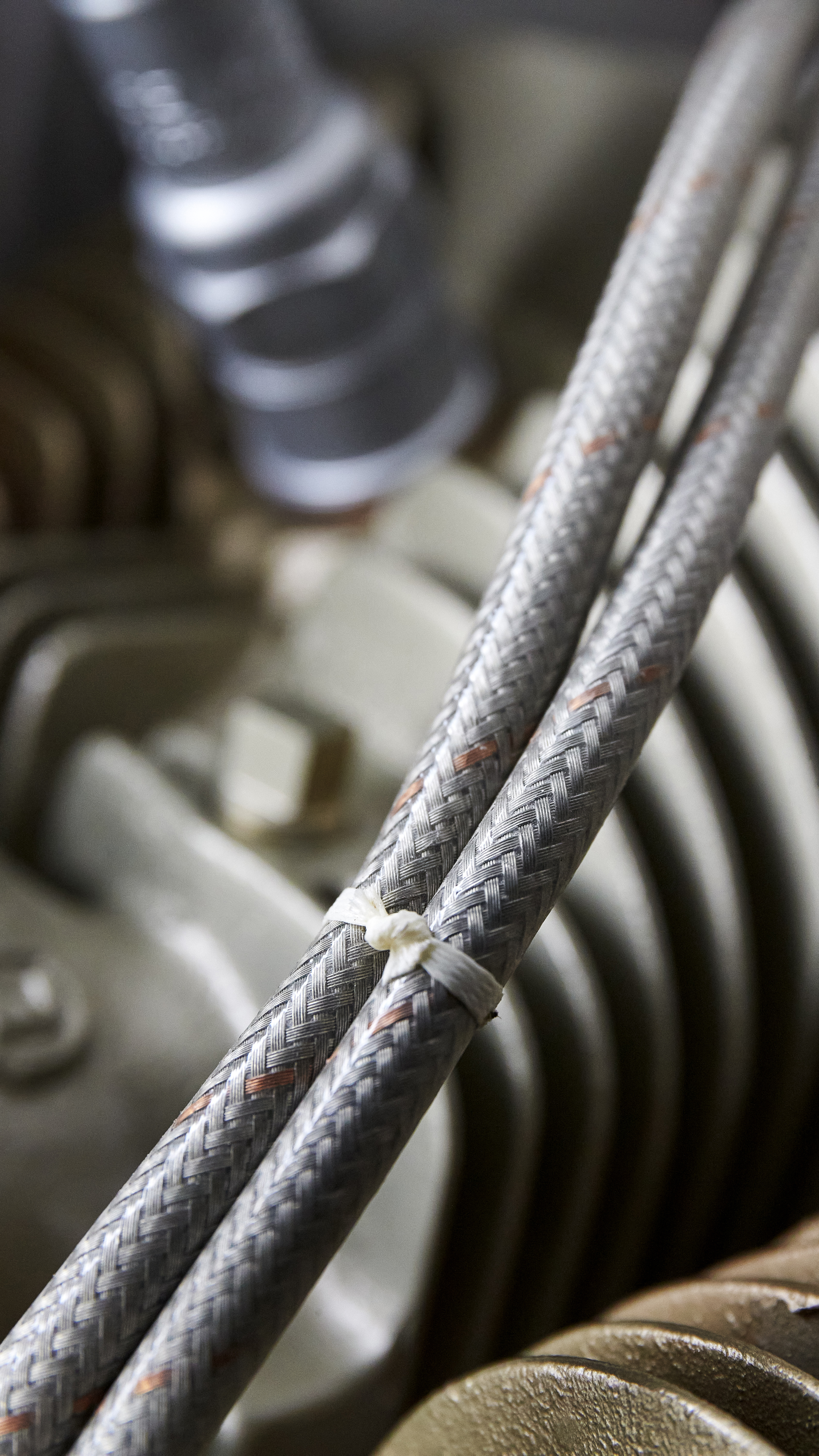 The ignition harness is neatly bundled together using hand-tied Breyden lacing tape, exactly as the Cessna factory had done in 1968.