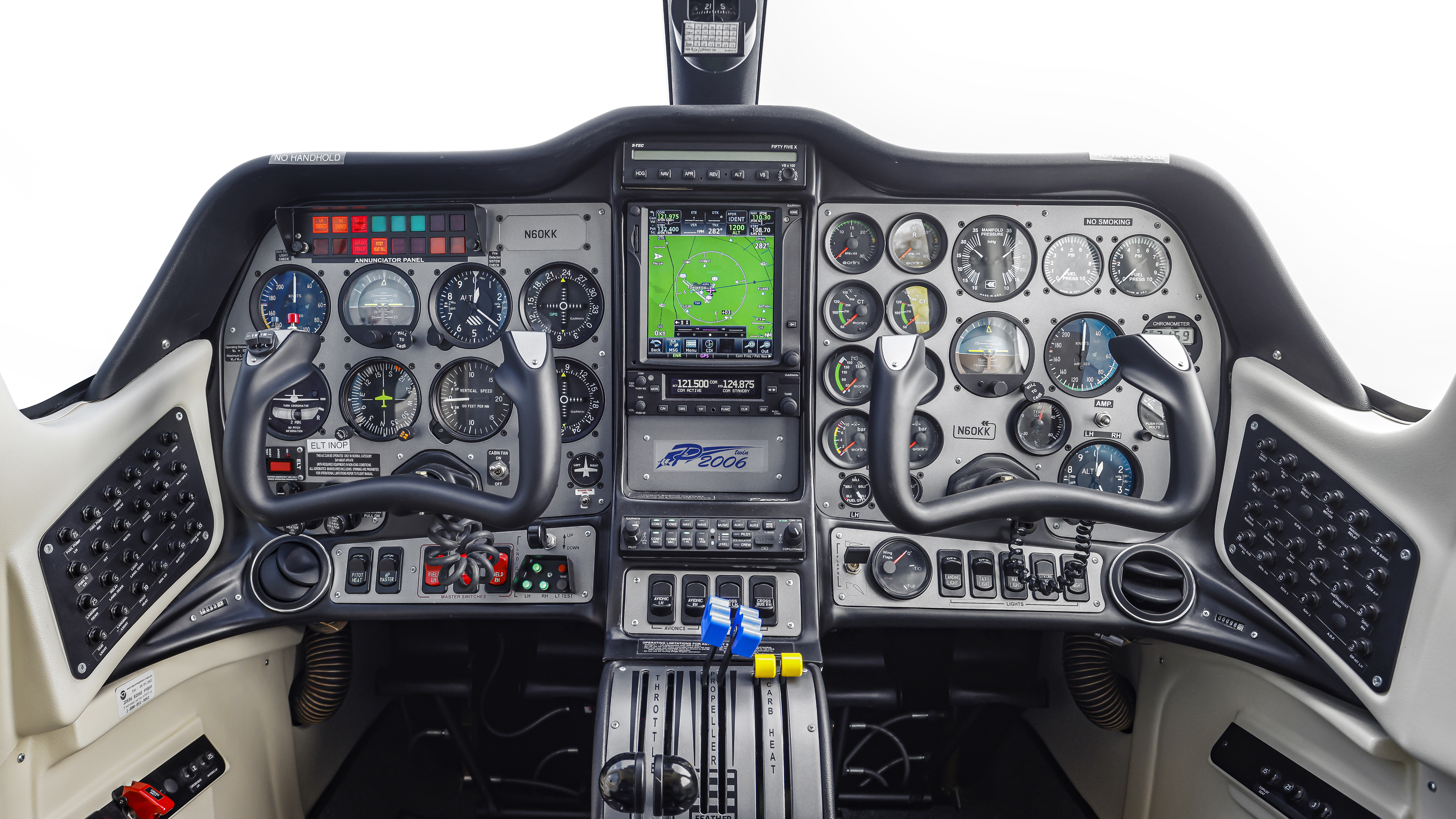 The front office of the Tecnam P2006T was designed to emulate the flight decks of larger aircraft, and it does have similar placements of electrical busses, fuses, and more.