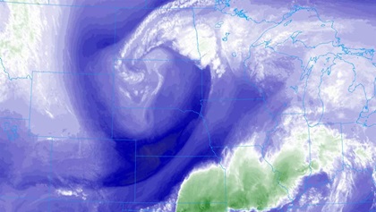 This shot shows the upper-level water vapor concentrations. The circulation around the low-pressure area persists from the ground up, and mimics the patterns seen on the infrared and low-level water vapor images. The signatures in green indicate lots of water vapor, and confirm the big trouble spots.