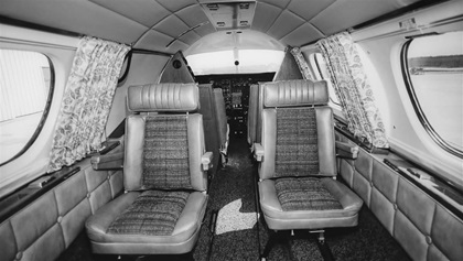 Early Lear Jet cabins were cramped—and tacky by today’s standards. The cabin also had little headroom. Bill Lear countered by saying “You don’t stand up in your Cadillac, do you?”