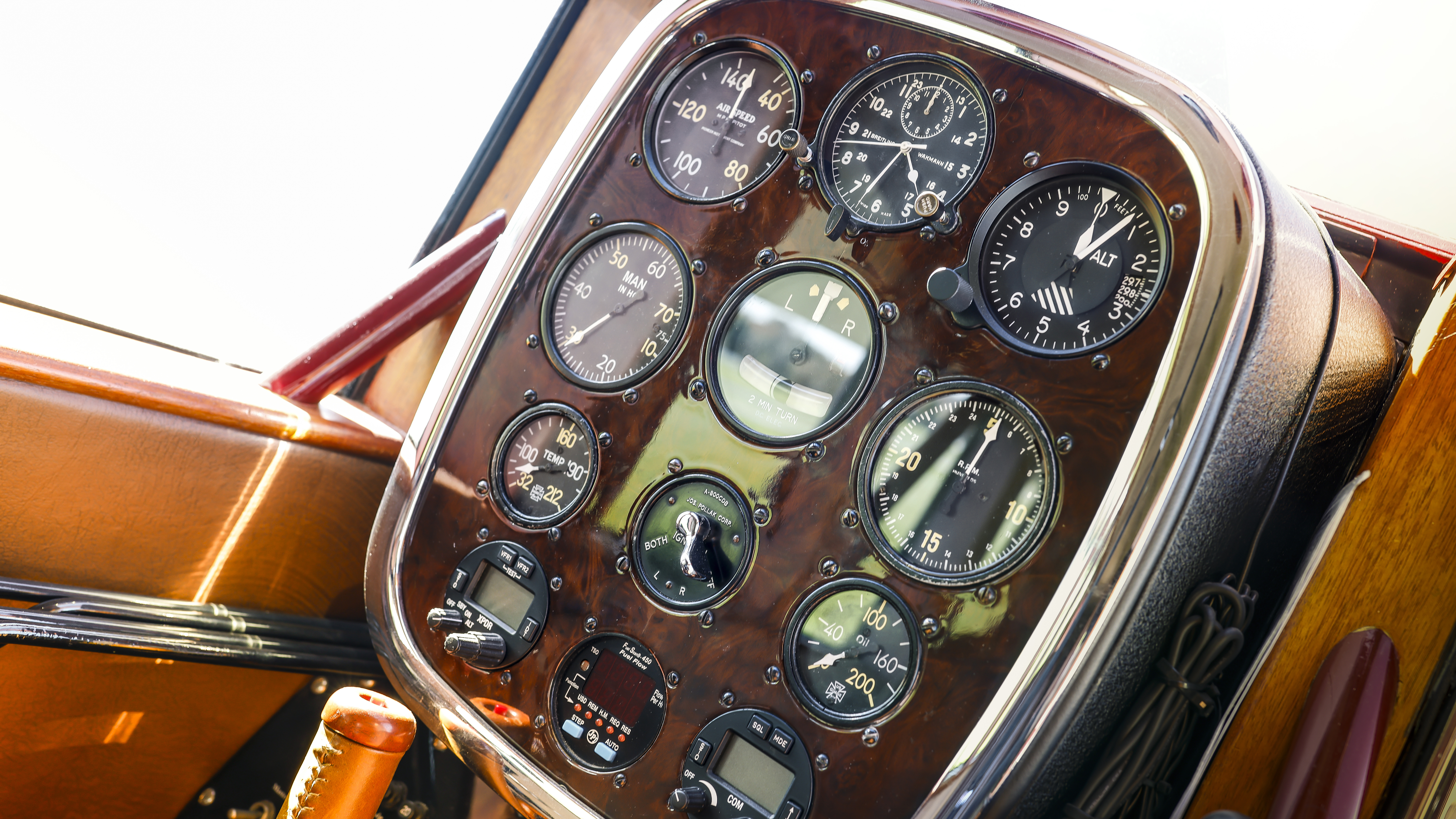 The instrument panel is mostly original but contains a modern radio, fuel computer, and transponder.