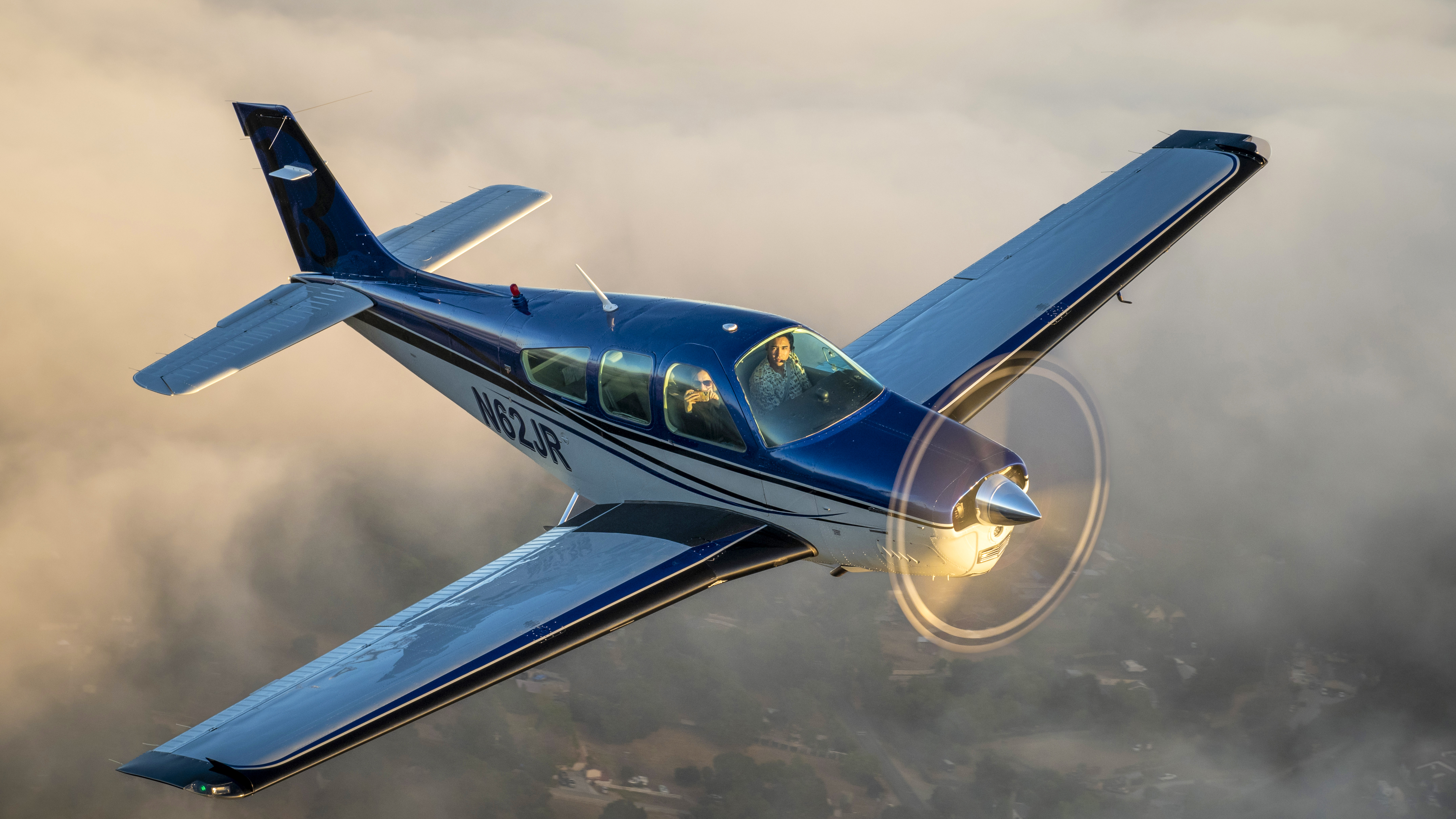 Owen Leipelt pilots the refurbished Bonanza over Monterey Bay in California.