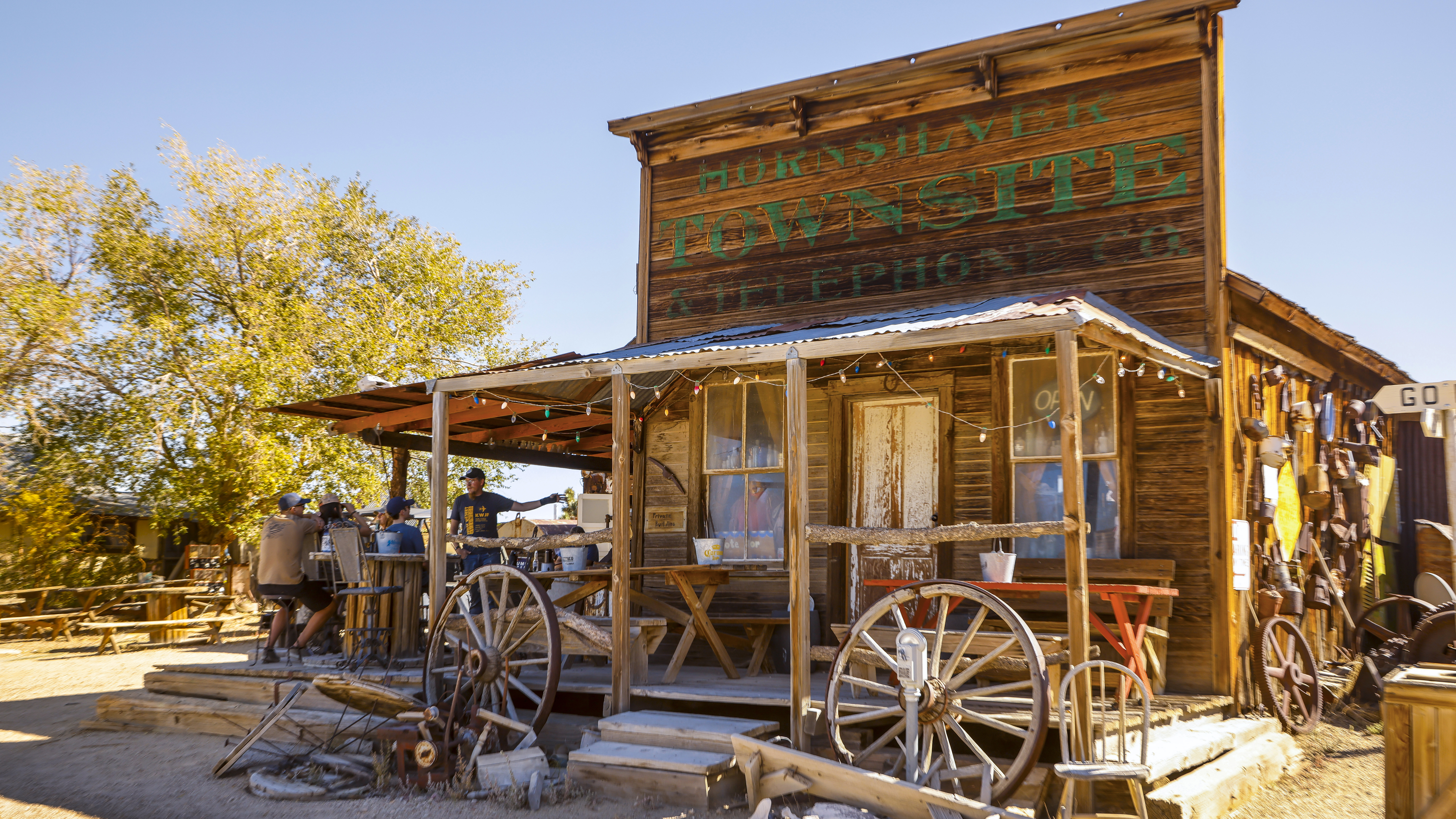 Taking a break in the shade of the Gold Point Saloon.