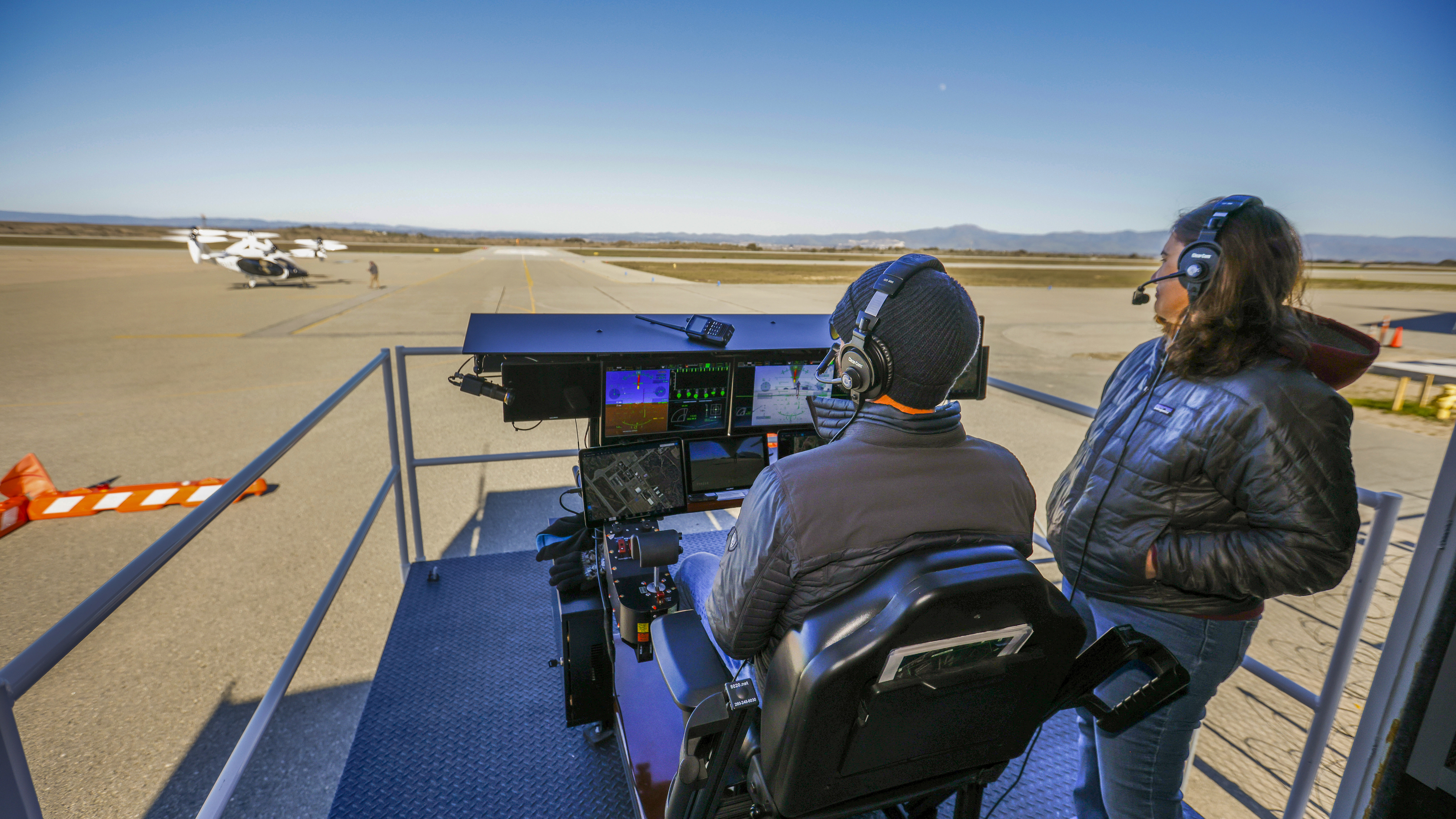 A human pilot in the DCS’ “cockpit” serves as the real pilot during autonomous test flights.
