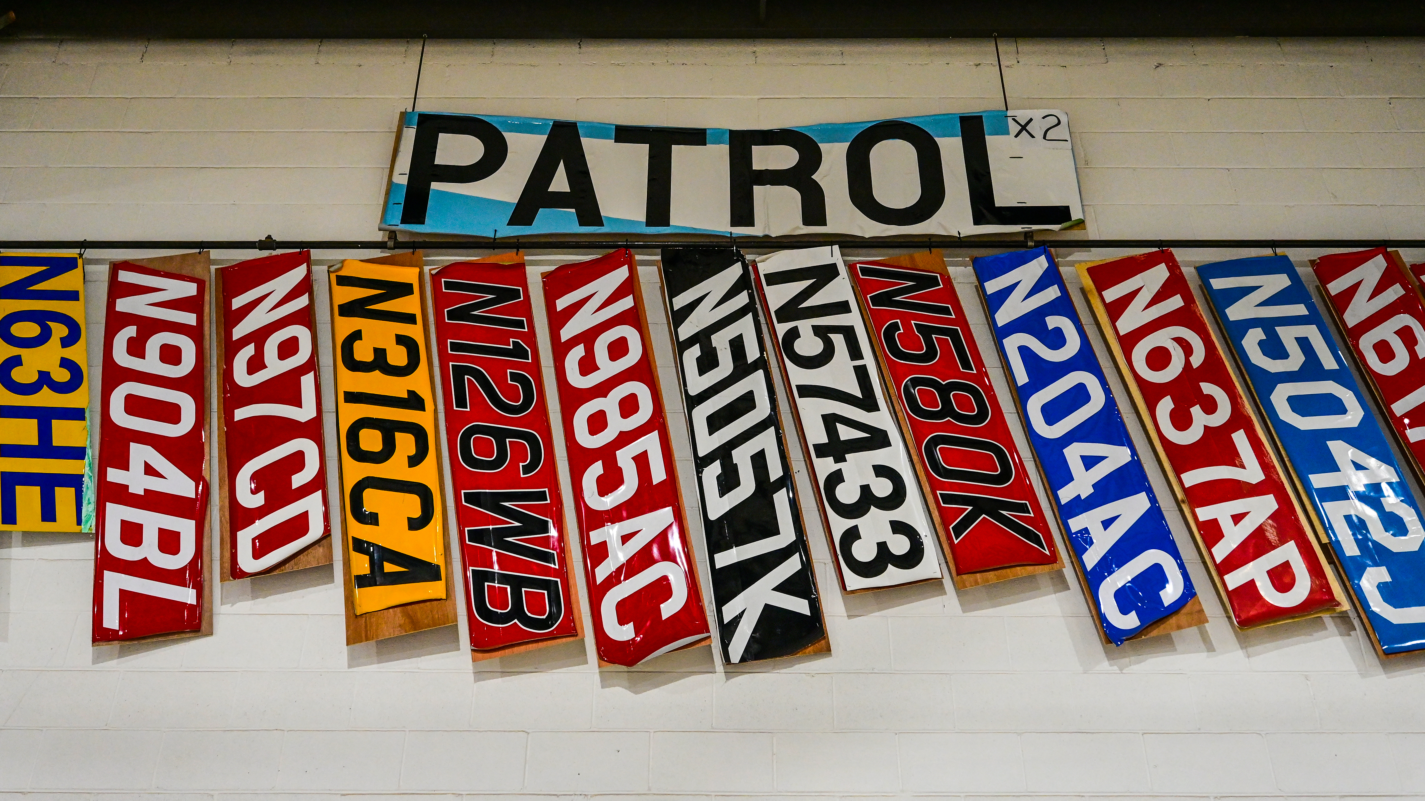 The “Wall of Shame” at American Champion Aircraft pays homage to the tailwheel aircraft that are completely rebuilt at the facility after sustaining damage, typically from ground loops.