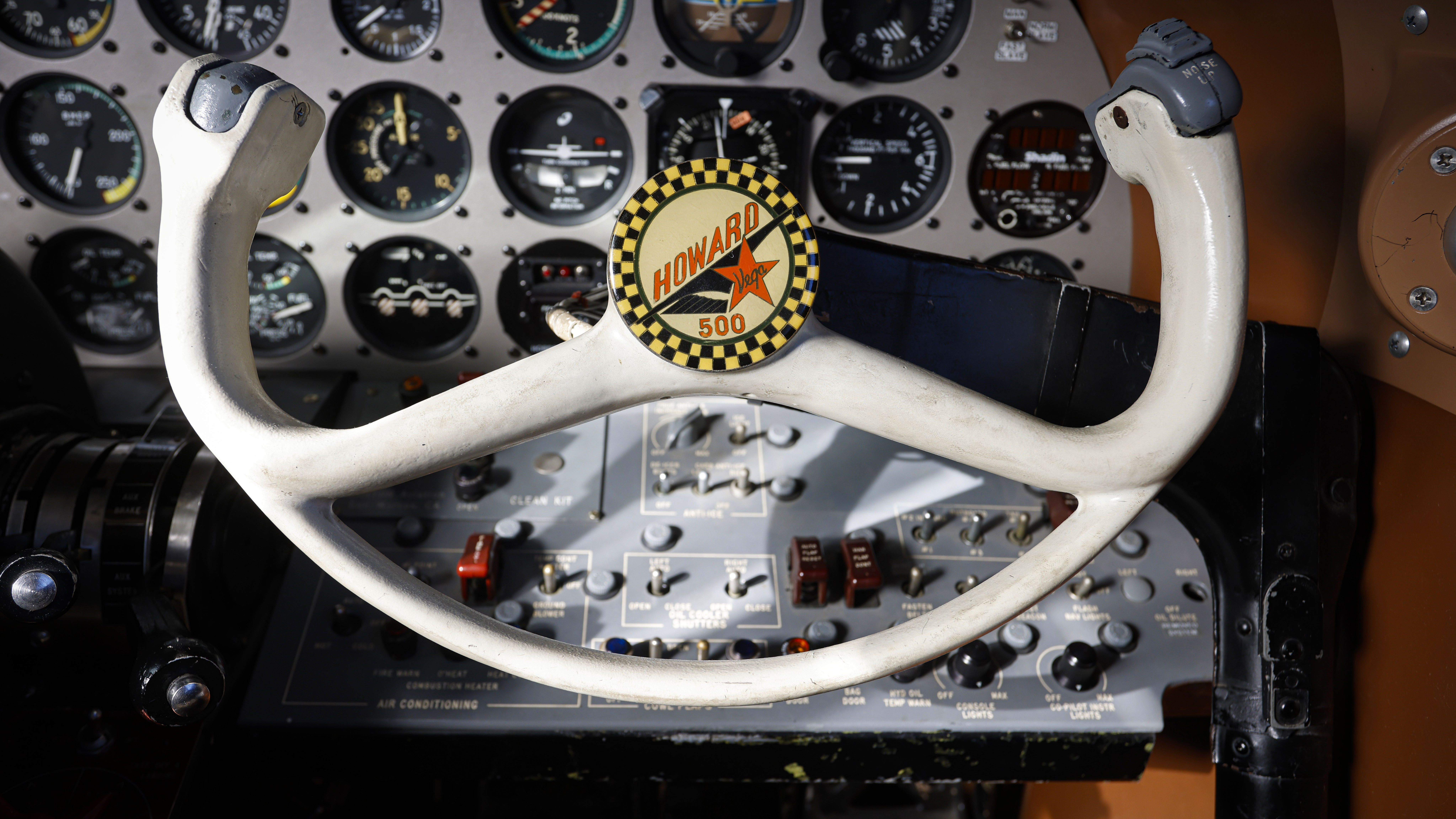 There are two control yokes, and both are decorated with a Howard 500 emblem.