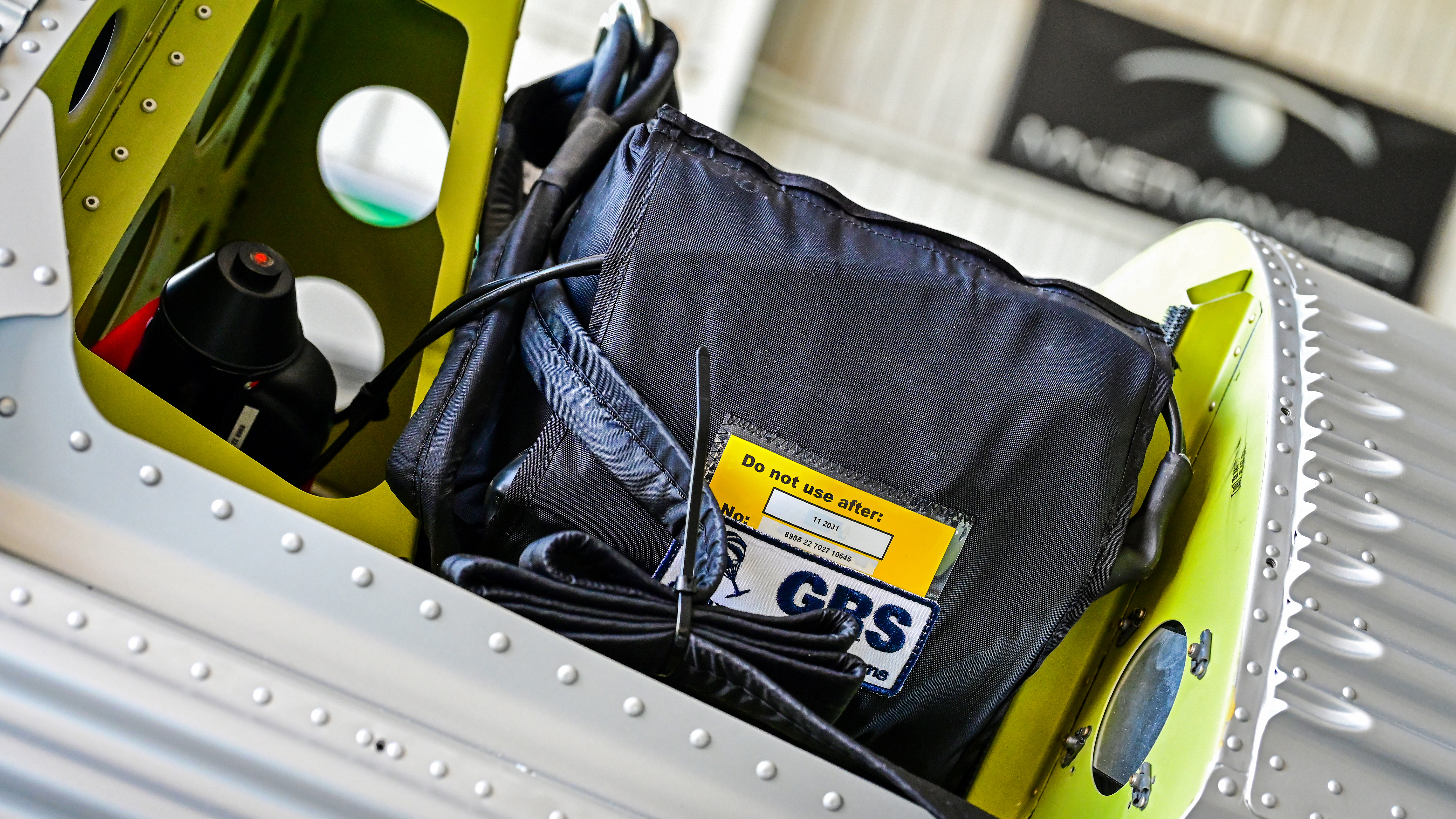 The ballistic parachute, which is stored behind the front cockpit’s seat.