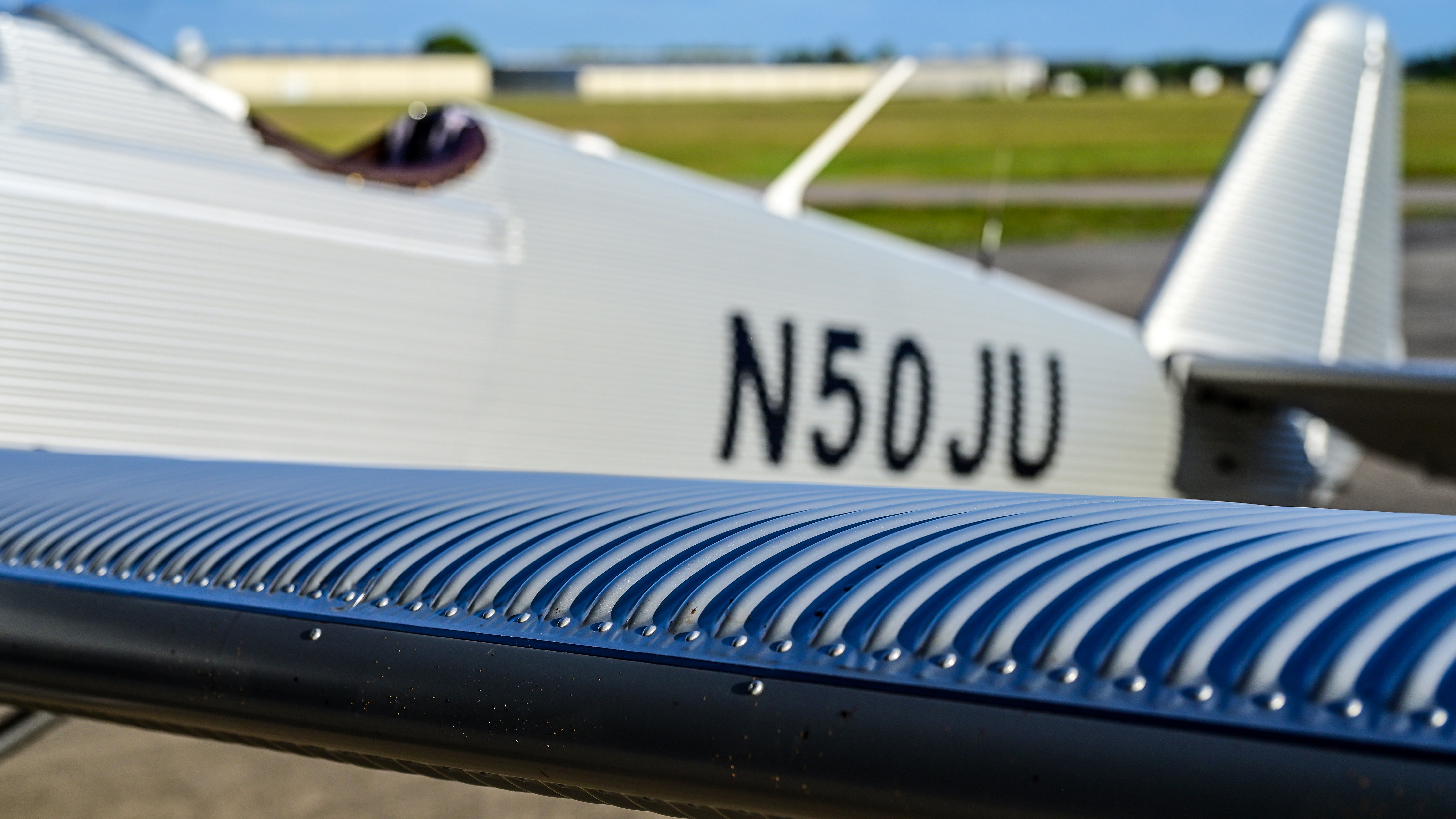 The corrugation imparts some strength to the airframe, but at the cost of frontal drag and vortices.