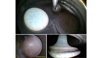Borescope images of the number 2 exhaust valve appeared perfectly normal.