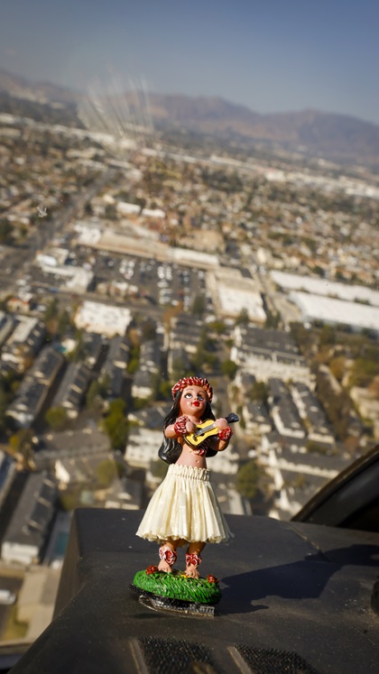 Bailey the hula girl accompanies Fitzgerald on ever flight – and he has a drawer of standbys for when the statues wear out and turn purple from the sun.