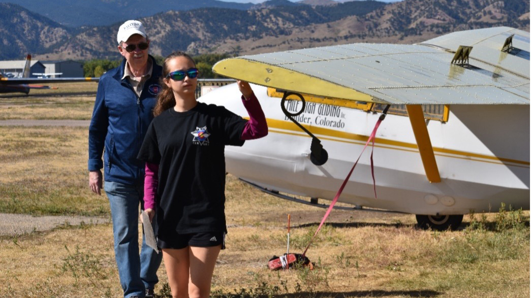Final preflight check before the author's solo flight with Gen. John Barry by her side.