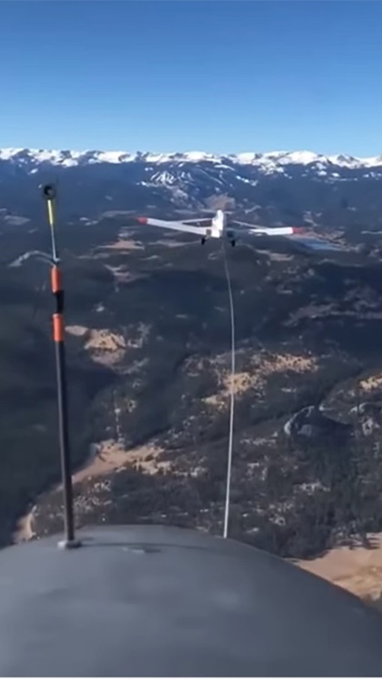 Moments before towplane release, ready to glide through the mountains. Photo by Mikayla Galler.