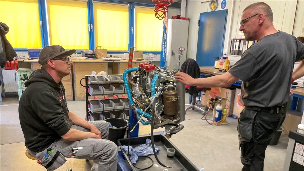 An S12's center section carries the engine, wing, and retractable gear.