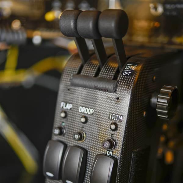 Three power levers control eight electric motors.