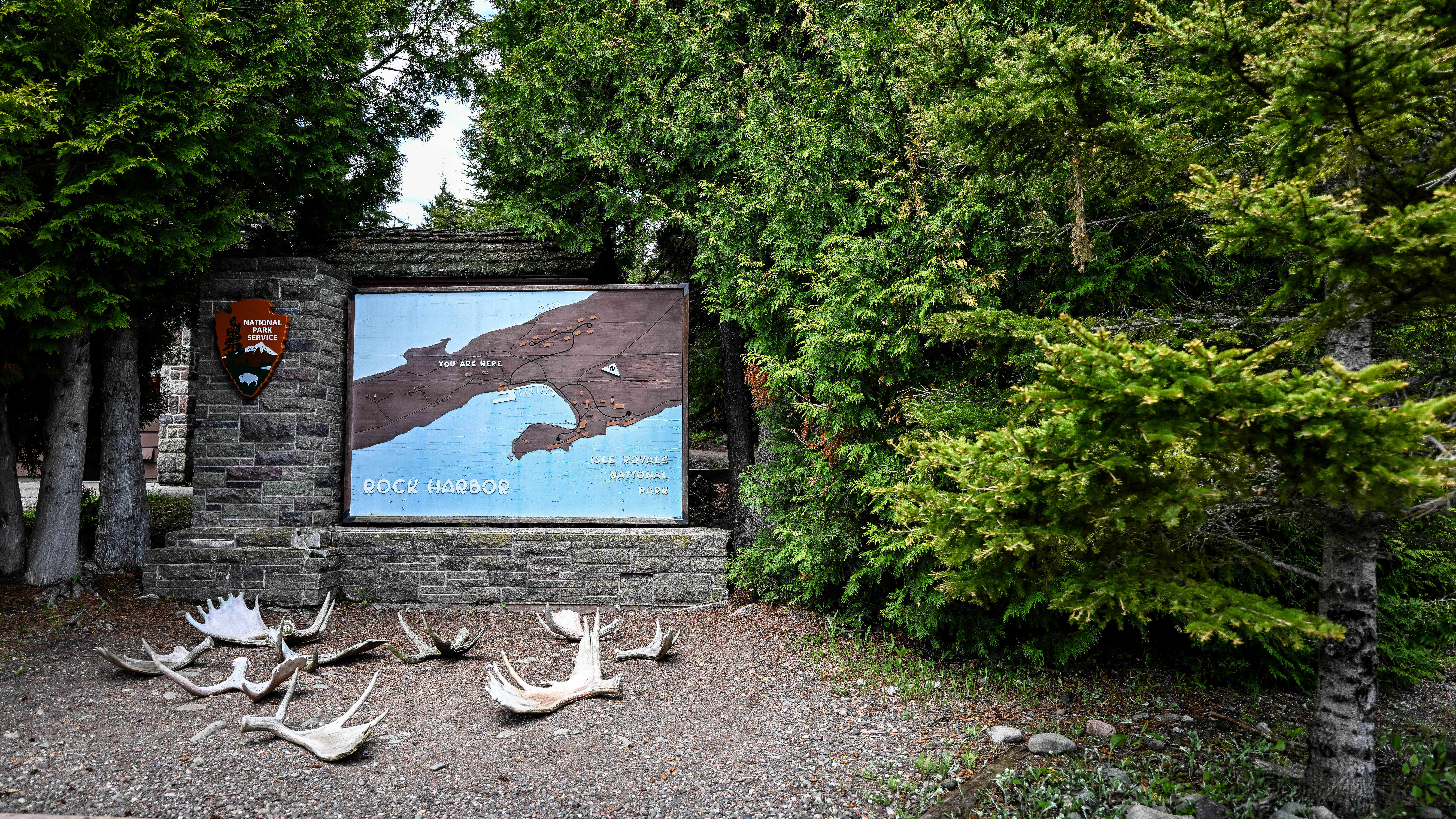 Isle Royale is the least-visited national park in the Lower 48. Moose antlers mark the Rock Harbor Visitor Center near a camping supply store and the lodge.