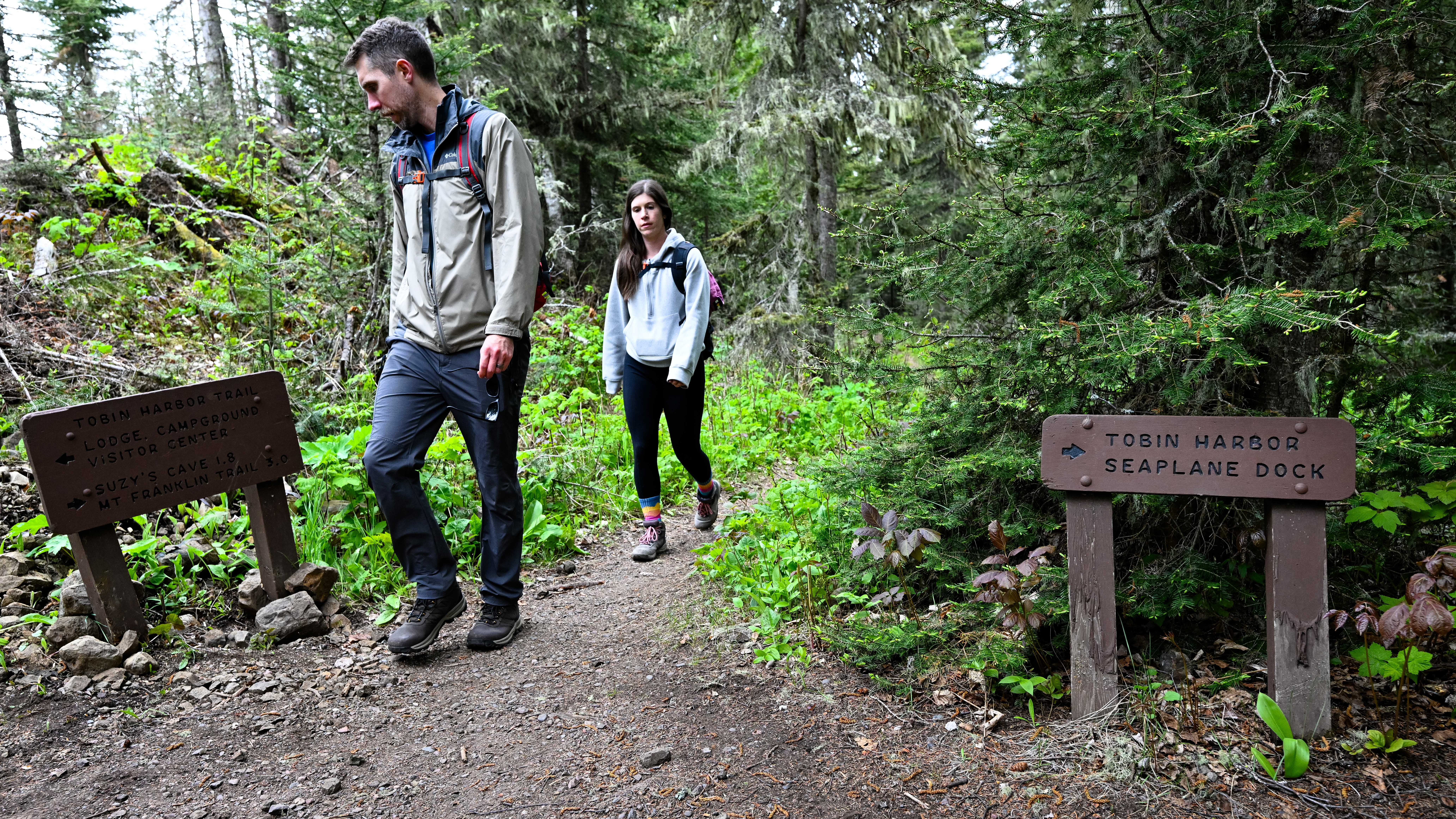 Hikers explore a trail on the island’s southeast side.