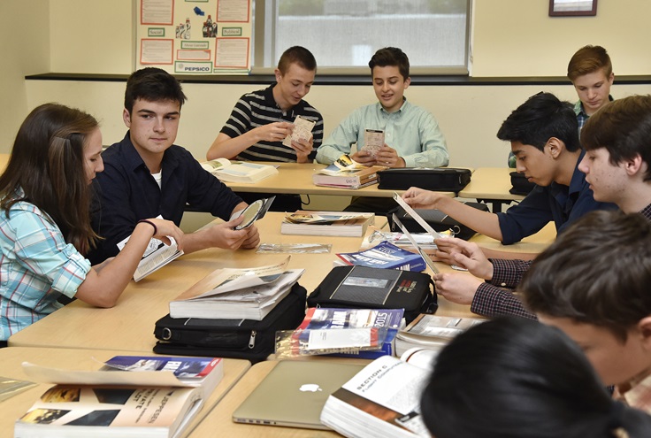 Students learn ground school techniques in Holly Branch's class at Raisbeck Aviation High School in the Seattle suburb of Tukwila, Washington. The school added courses in science, technology, engineering, and math (STEM) to the traditional high school curriculum. Photo by David Tulis.        
