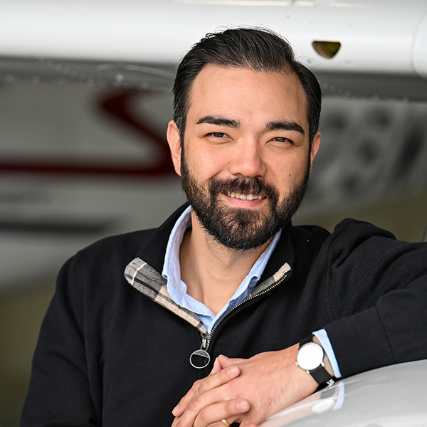 Chad Jones, AOPA Pilot magazine managing editor, is shown at Frederick Municipal Airport in Frederick, Maryland, May 6, 2024. Photo by David Tulis.