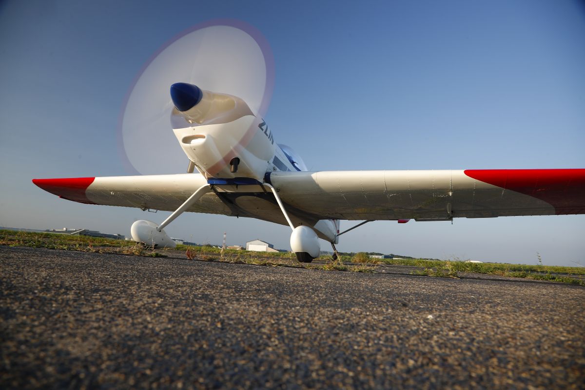 Photoshoot over the Delaware bay of a 1986 Moravian Zlin Z50 LS flown by Dave Hirschman.