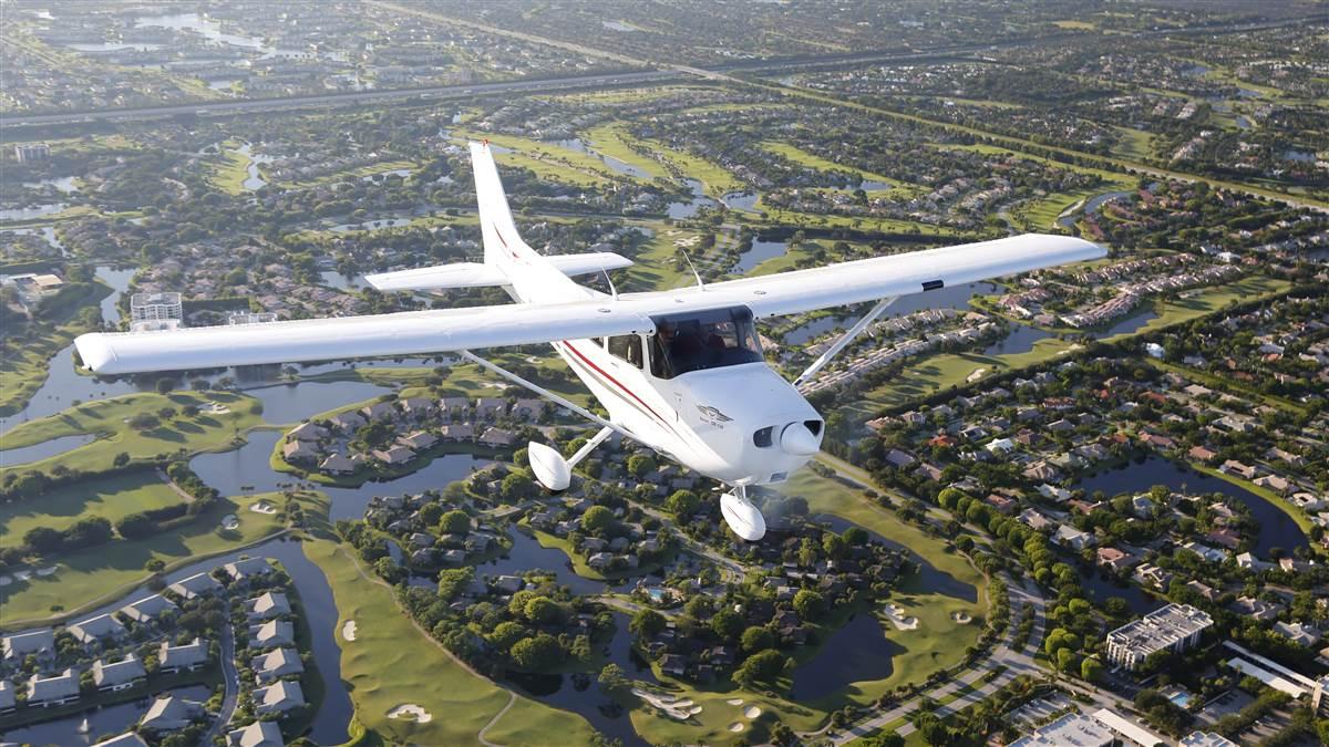 cessna flying over suburbs