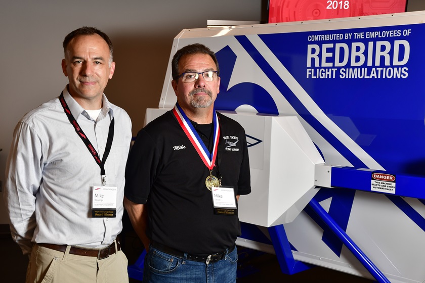 Blue Skies Flying Services was recognized as the best flight school in the Great Lakes region in the 2021 AOPA Flight Training Experience Survey. Pictured here are Chief Flight Instructor Mike Biewenga, left, and Blue Skies owner Mike Carzoli.
