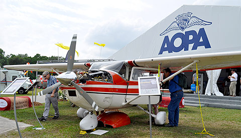 Sun 'n Fun reopens to sunny skies, and the AOPA tent welcomes attendees after a storm raged through the event Mar. 31.