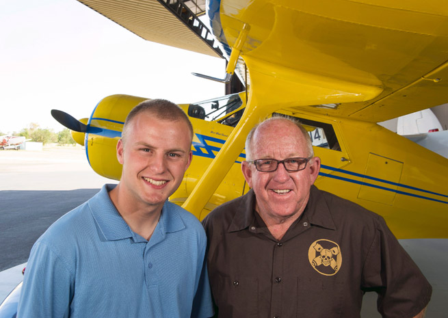 Jim Rollison and his father Jimmy Rollison in front of their Beech Staggerwing. Jim soloed a Taylorcraft on his sixteenth birthday.