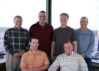 Bennon and his son, Chris, are flanked by his “team”: Dr. Frank Schwartz, Dr. Todd Fredricks, Strickler, and CFII Mike Knopp.