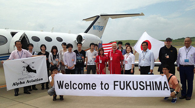 The crew is greeted in Fukushima, Japan, by participating students at Alpha Aviation.