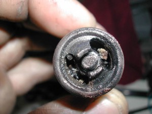 A worn-out spark plug.