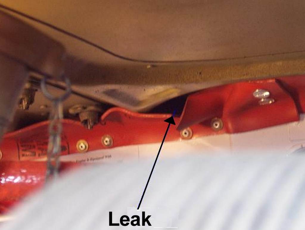 Close-up of a fairly significant cooling air leak due to a wrinkle in a flexible baffle seal. This problem was apparent only with the top cowl installed, and could be seen by inspecting through the front intake openings using a flashlight. It’s an excellent idea to look for such baffle seal problems during preflight inspection.